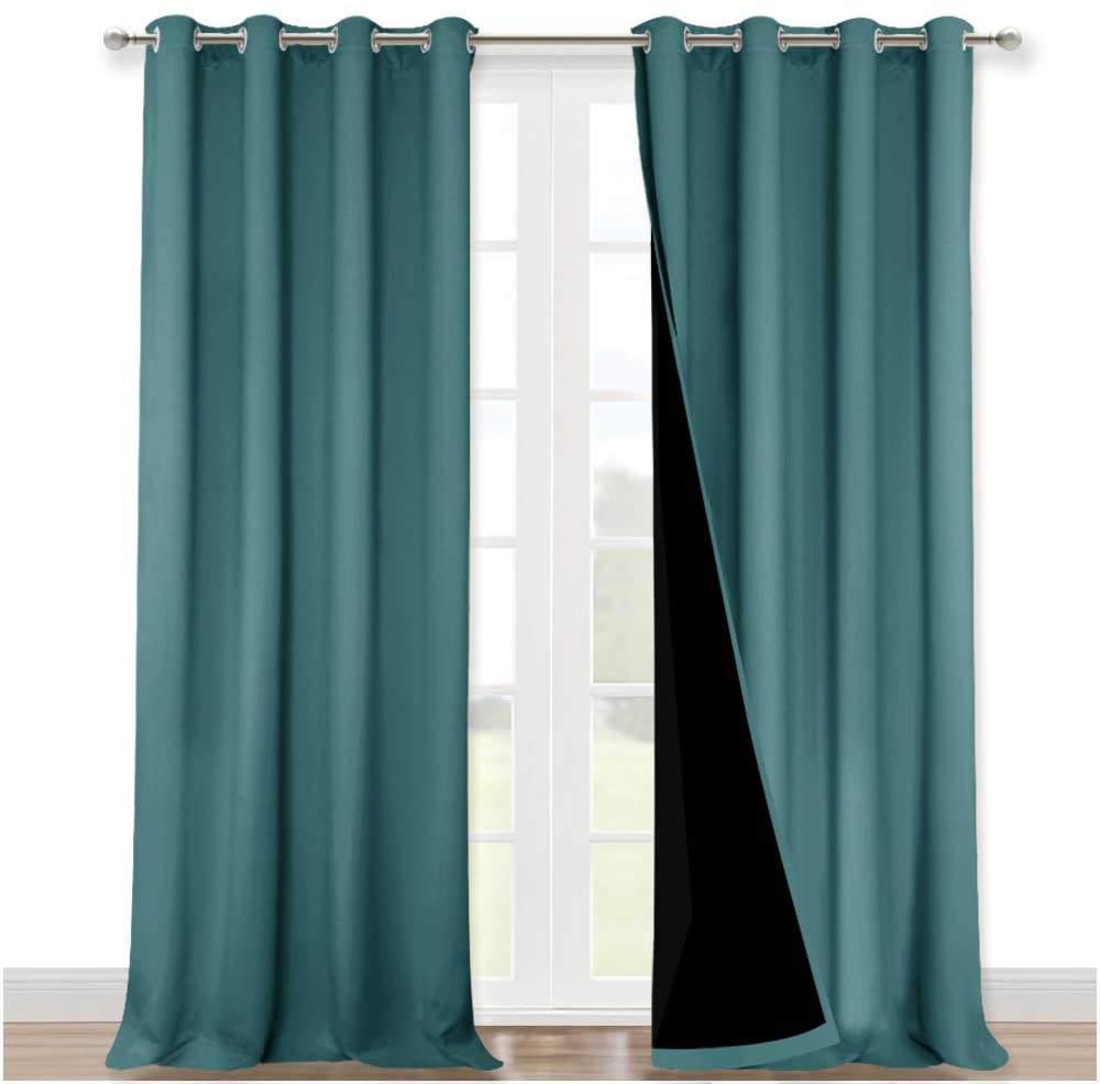 Teal double layer noise reducing living room curtains with silver grommets, showing blackout lining