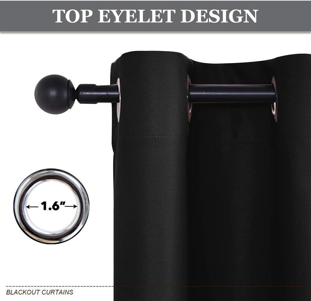 Close-up of black grommet blackout curtain, highlighting the 1.6-inch top eyelet design on a rod, for noise reducing living room & bedroom.