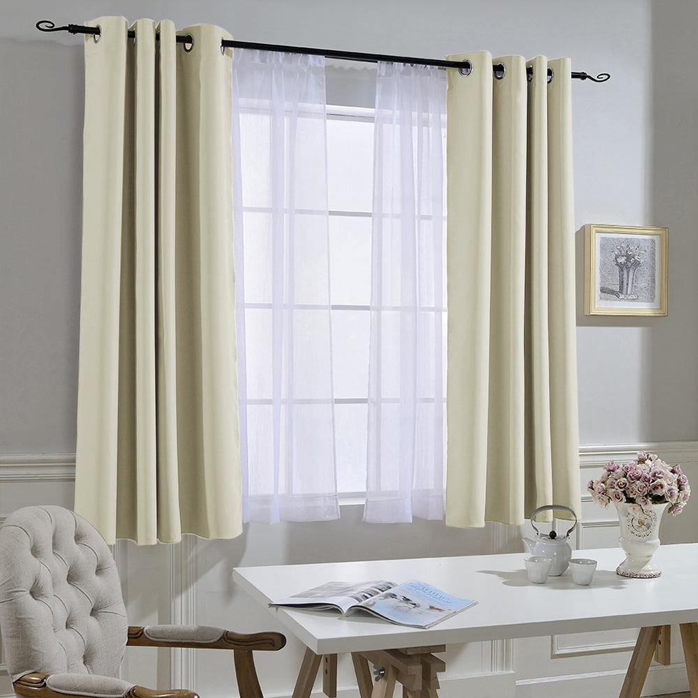 Cream grommet noise reducing blackout curtain 2 panels with sheer drapes, enhancing privacy in a living room or bedroom.