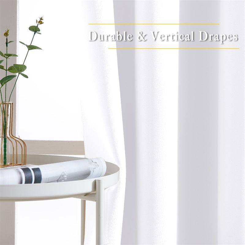 Close-up of a durable white thermal insulated blackout curtain panel, showcasing its vertical drape in a modern living room setting.