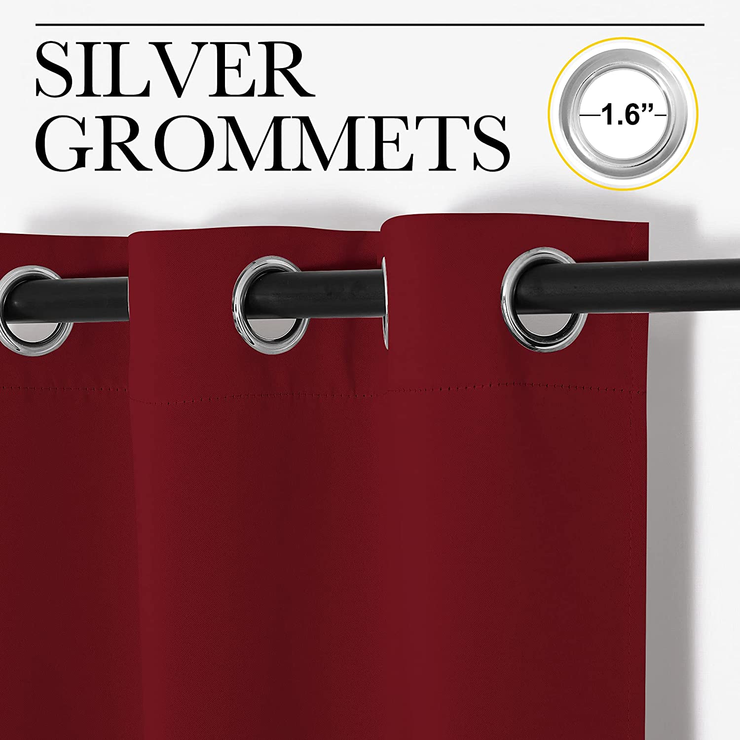 Detail of deep red thermal insulated blackout curtain for living room, featuring 1.6" silver grommets on a black rod.
