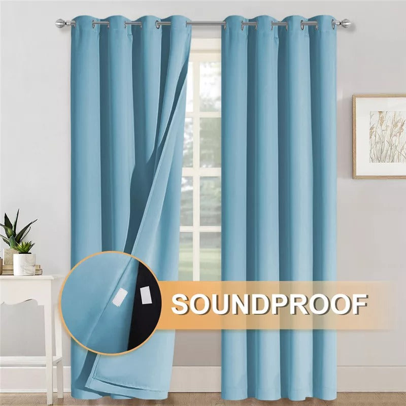 Light blue grommet thermal blackout curtains (2 panels) with inner layer revealed, highlighting soundproof privacy for living room/bedroom.