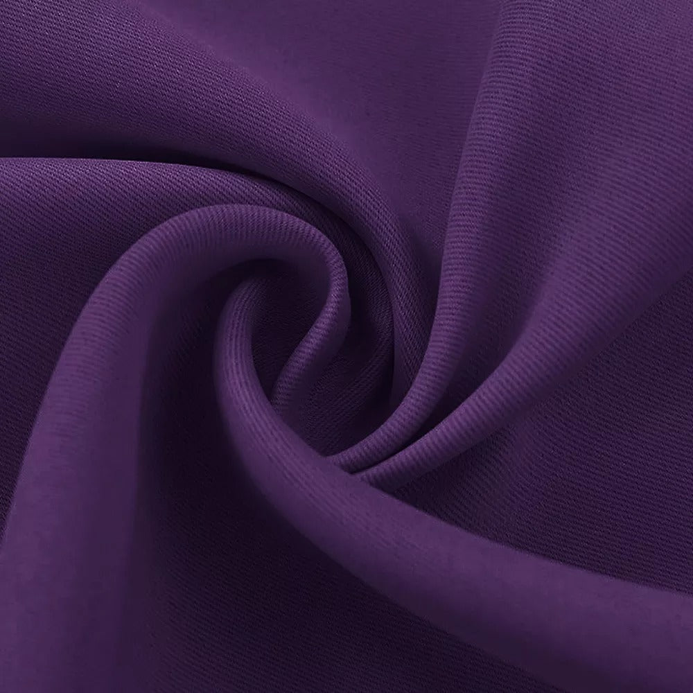 Close-up of rich purple 3-layer thermal soundproof blackout curtain fabric with soft folds, ideal for living room & bedroom.