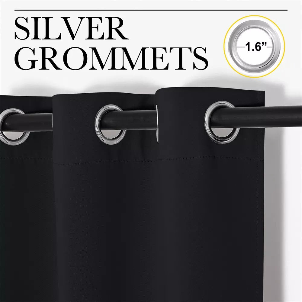 Close-up of black 3-layer thermal soundproof blackout curtains with 1.6-inch silver grommets on a dark curtain rod.