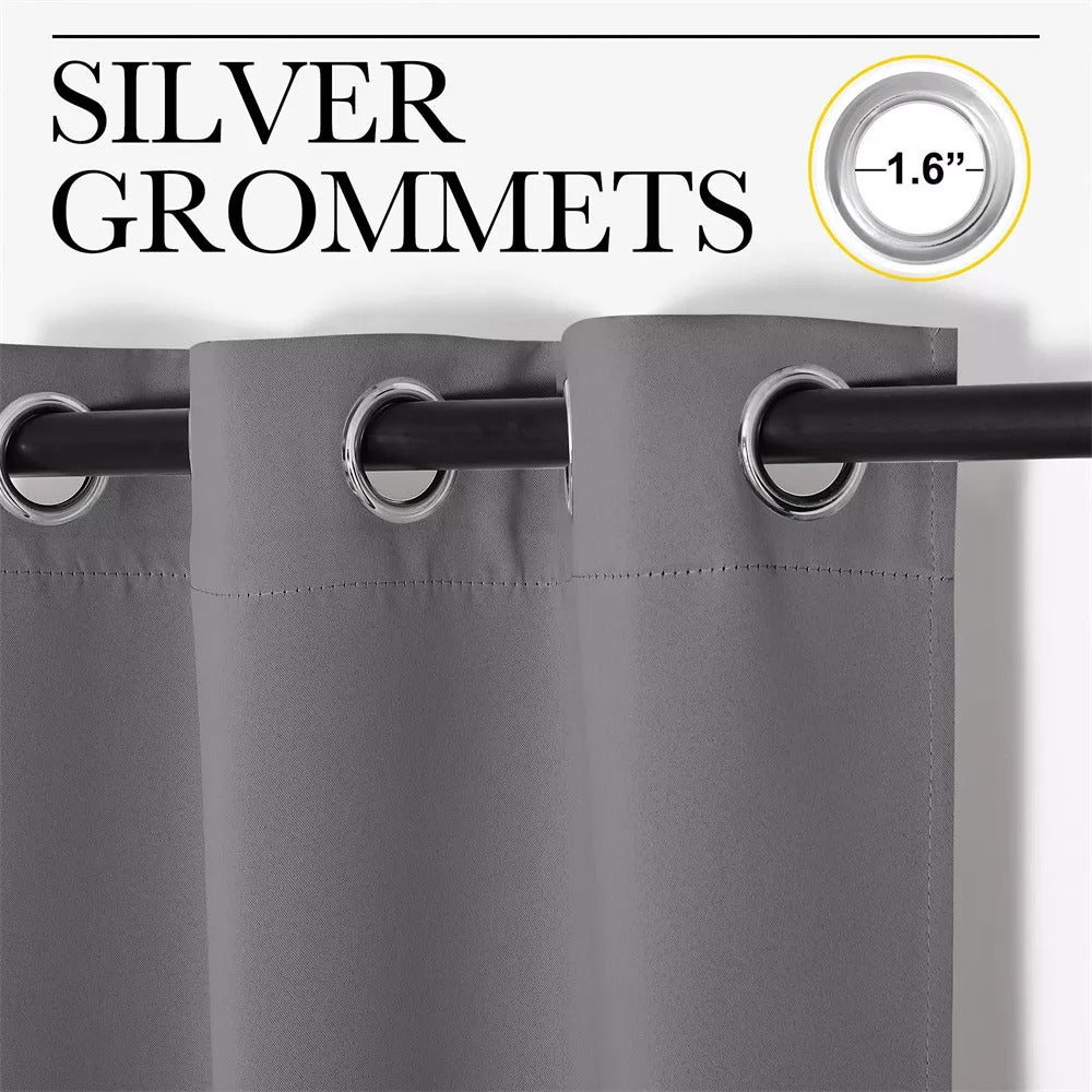 Close-up of gray thermal blackout curtain panels, highlighting shining silver 1.6-inch grommets neatly on a dark rod.