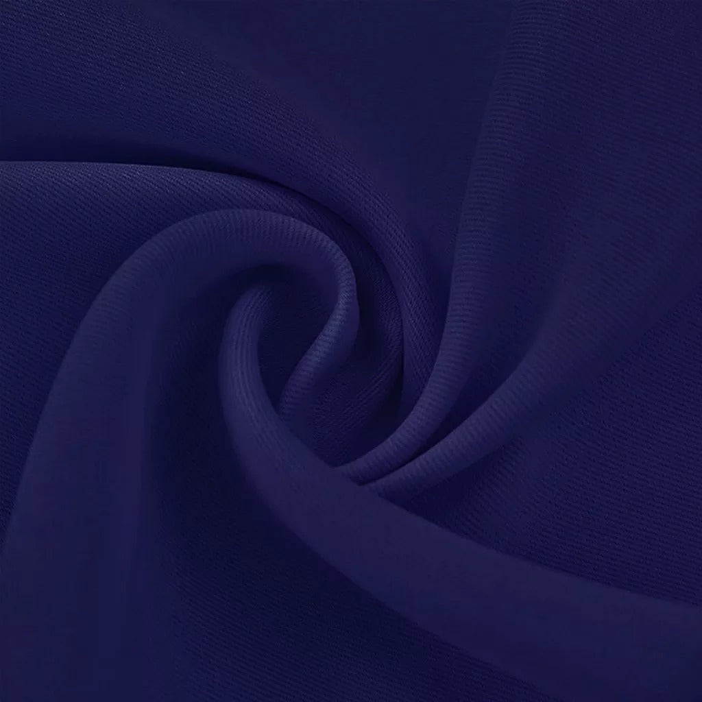 Close-up of deep navy blue 3-layer thermal soundproof blackout curtain fabric with subtle texture and elegant folds.