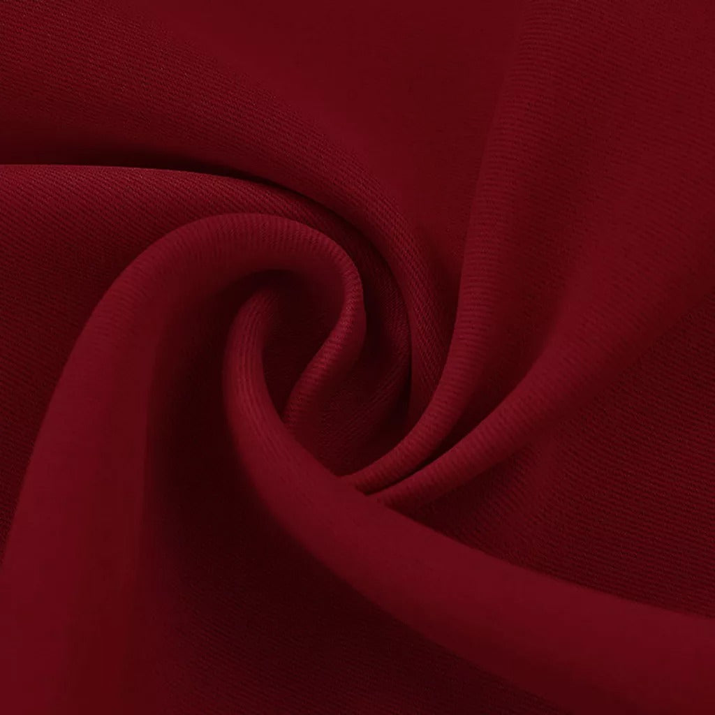 Close-up of deep red, thick 3-layer fabric, showing the texture of the thermal soundproof blackout curtain material.