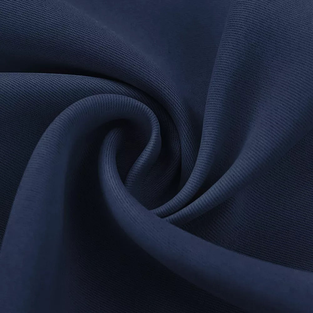 Close-up of navy blue 3-layer thermal soundproof blackout curtain fabric, showcasing its durable weave and soft texture.