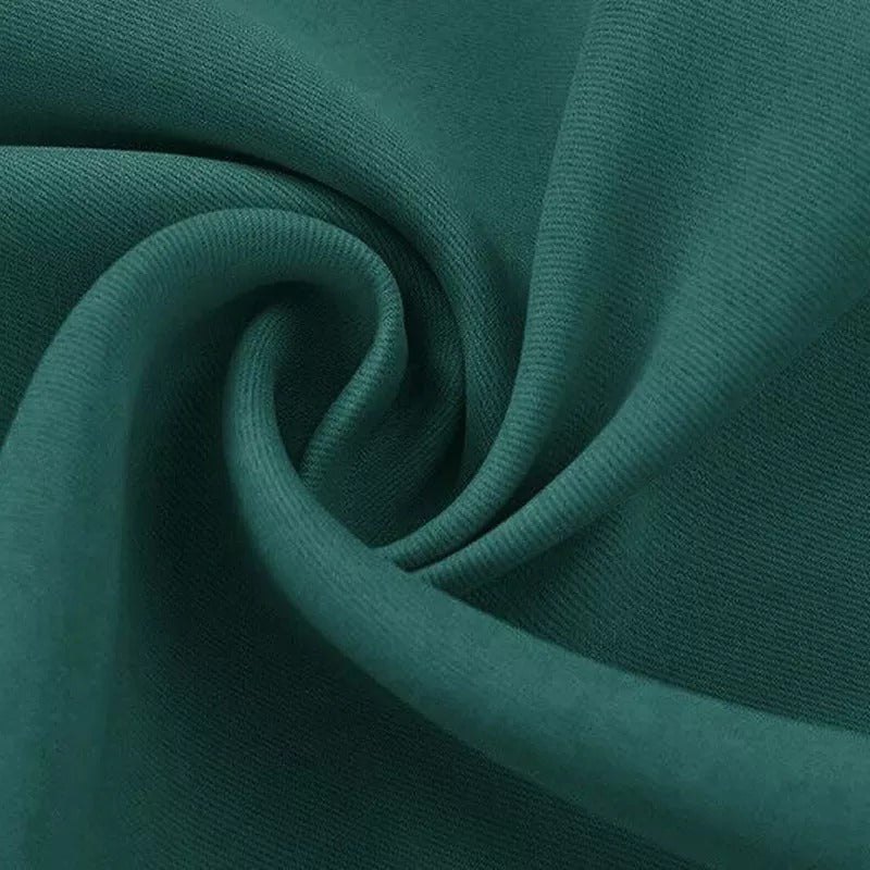 Detailed view of deep teal green 3-layer thermal soundproof blackout curtain fabric, highlighting its rich texture & folds.