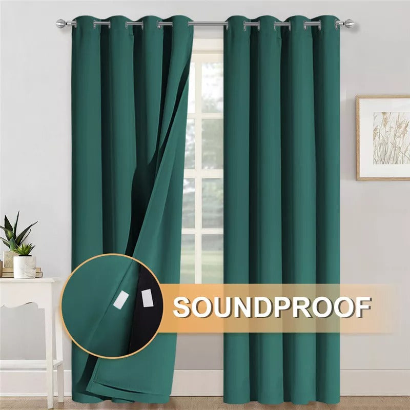 Two deep green grommet 3-layer thermal soundproof blackout curtains. The pulled-back panel highlights thick, insulated fabric.