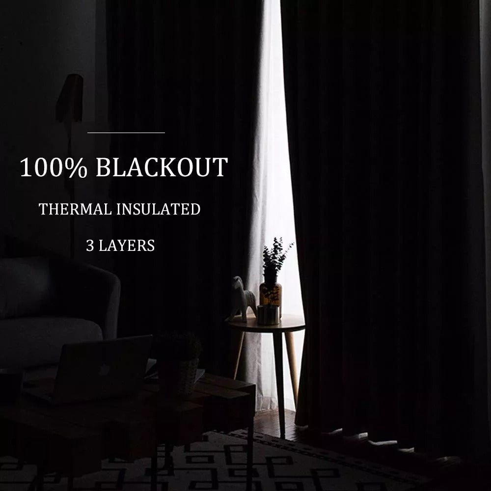 Dark living room with KGORGE 3-layer thermal grommet blackout curtains blocking 100% light, also providing soundproof privacy.