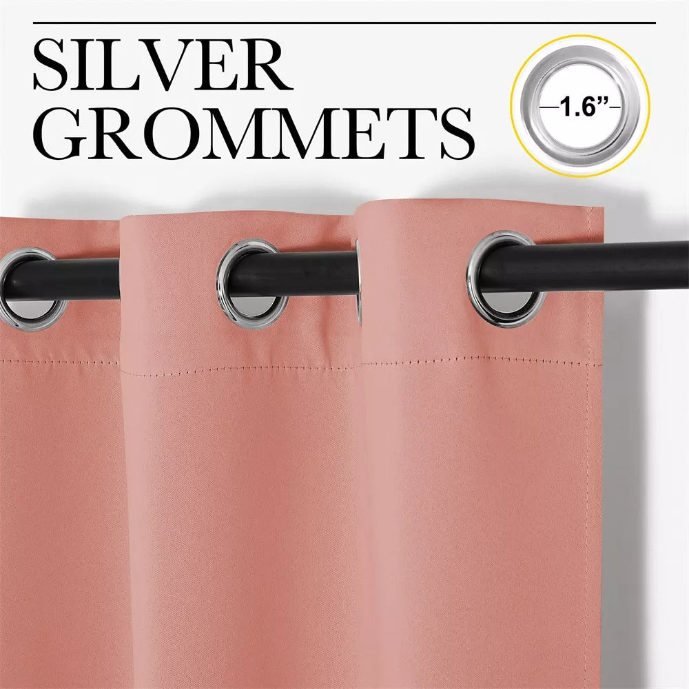 Close-up of pink 3-layer thermal soundproof blackout curtain with 1.6" silver grommets on a black rod.