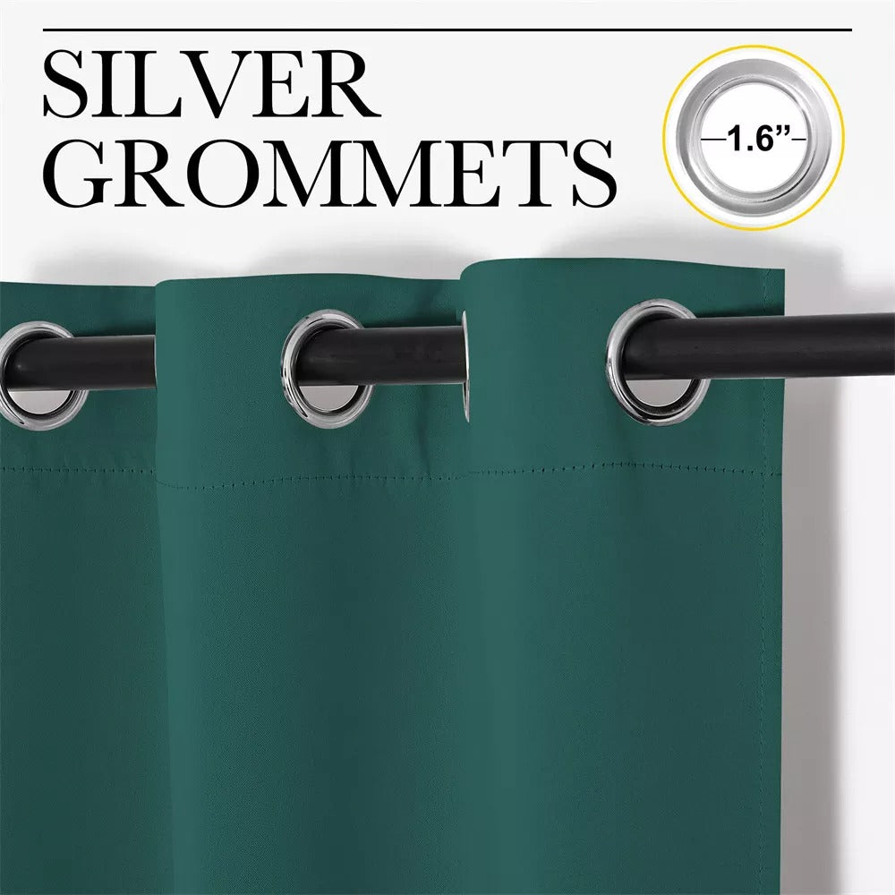 Close-up of 1.6 inch silver grommets on a dark green 3-layer thermal soundproof blackout curtain panel, hanging on a rod.