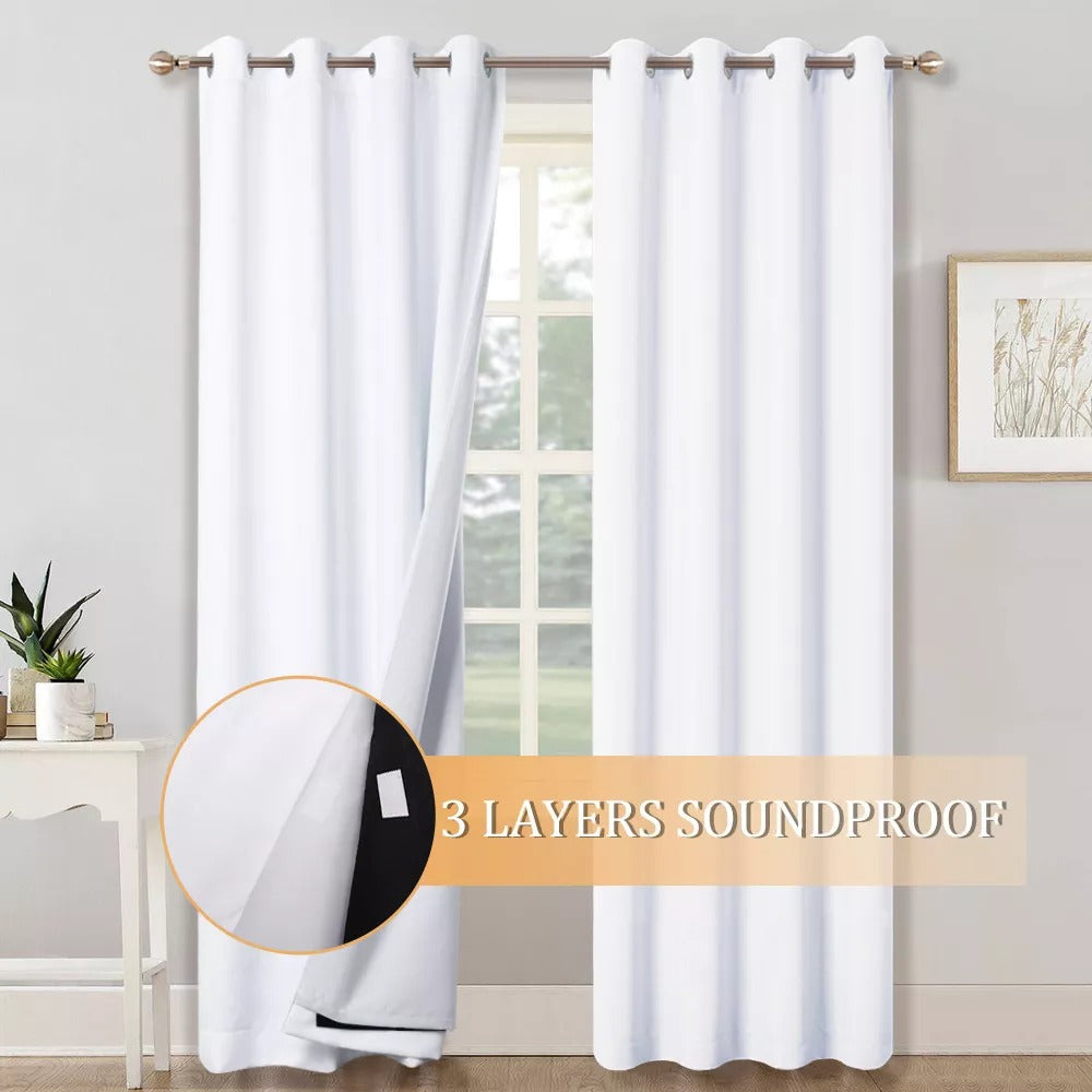 White grommet curtains showcasing 3-layer soundproof thermal blackout fabric for living room or bedroom windows.