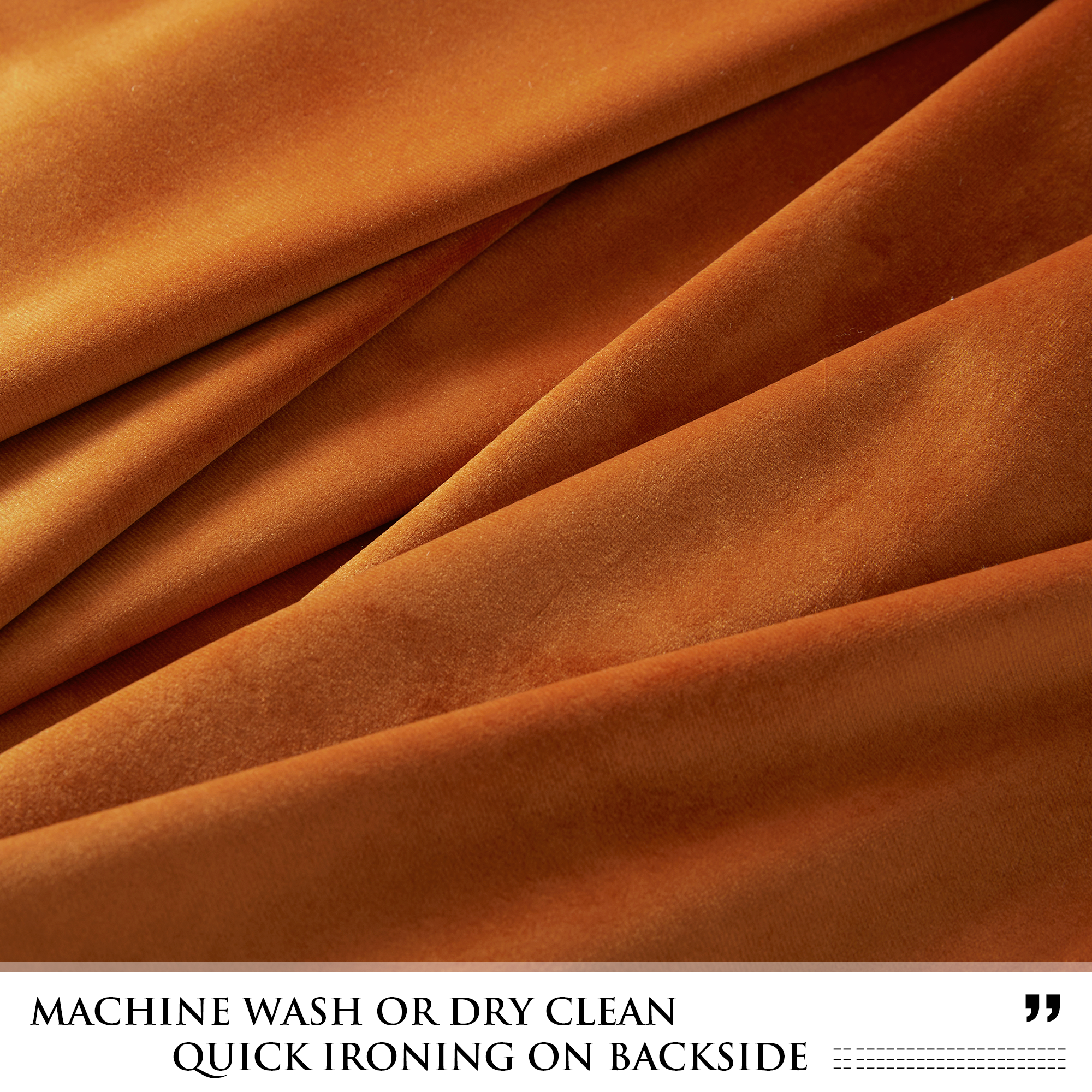 Close-up of rich rust-colored velvet blackout curtain fabric, showing its plush texture and elegant folds.