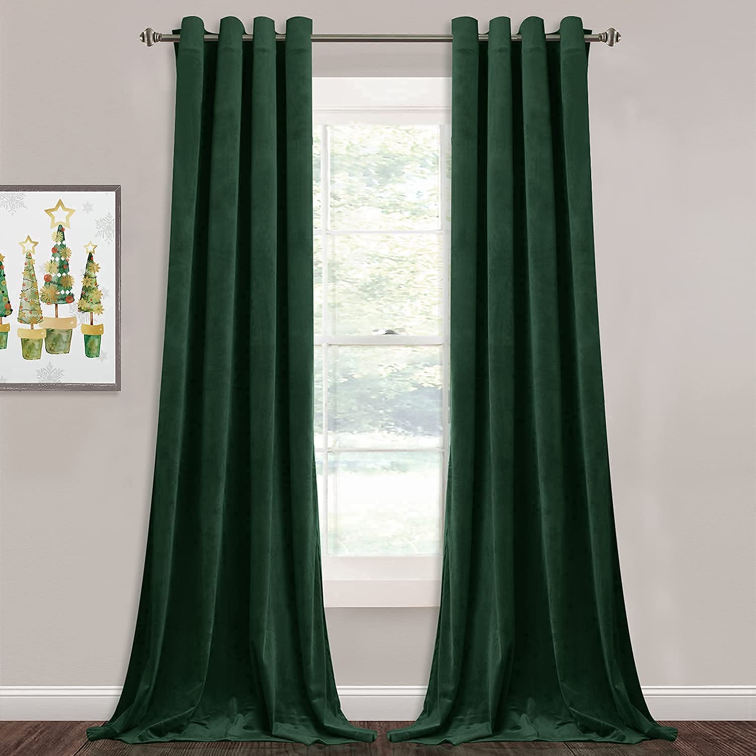 Two dark green velvet grommet blackout curtains pooling on floor, ideal for bedroom or living room privacy.