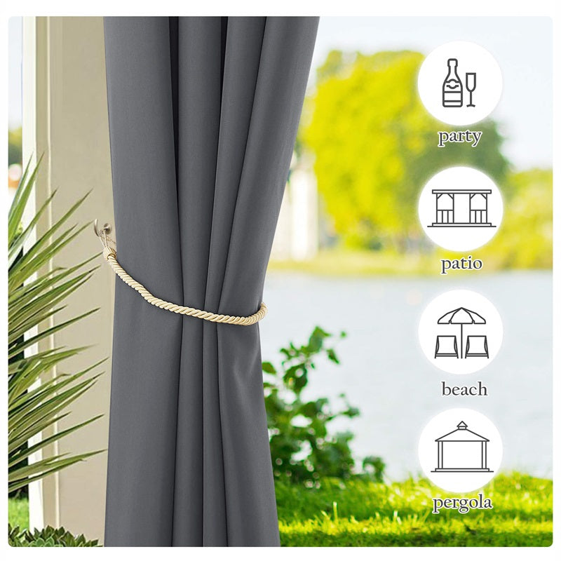 Dark gray waterproof outdoor canvas curtain tied back with a golden rope, ideal for patio, pergola, and outdoor living spaces.