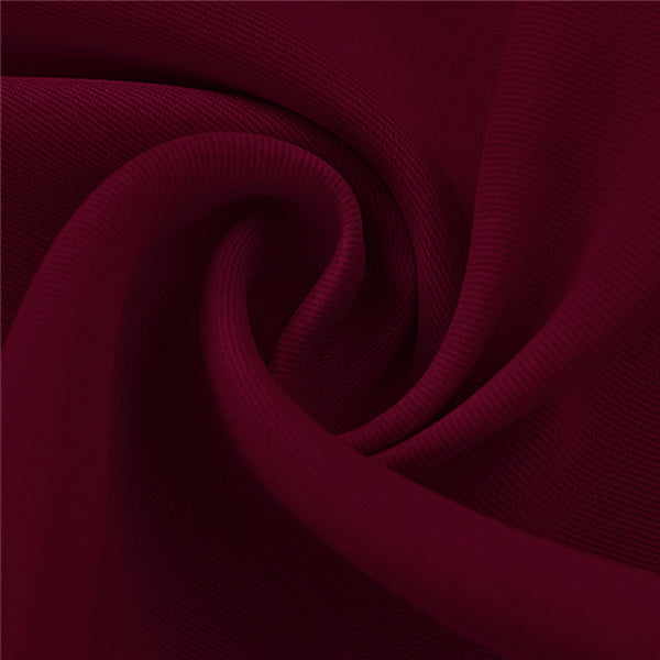 Rich burgundy KGORGE blackout outdoor curtain fabric sample, highlighting weatherproof texture and elegant drape.