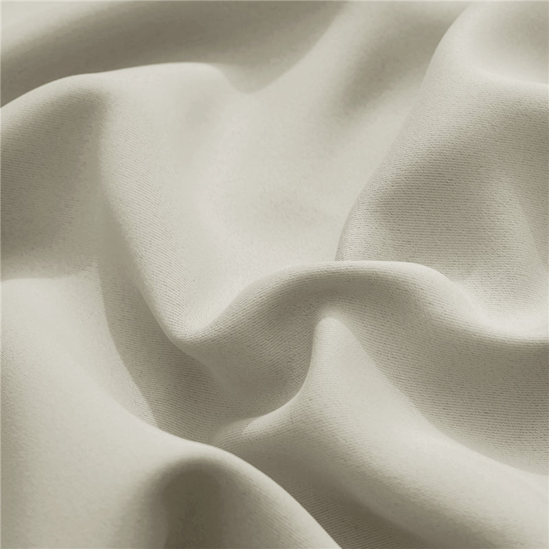 Light beige KGORGE outdoor curtain fabric sample, showing soft folds and durable, weatherproof texture.