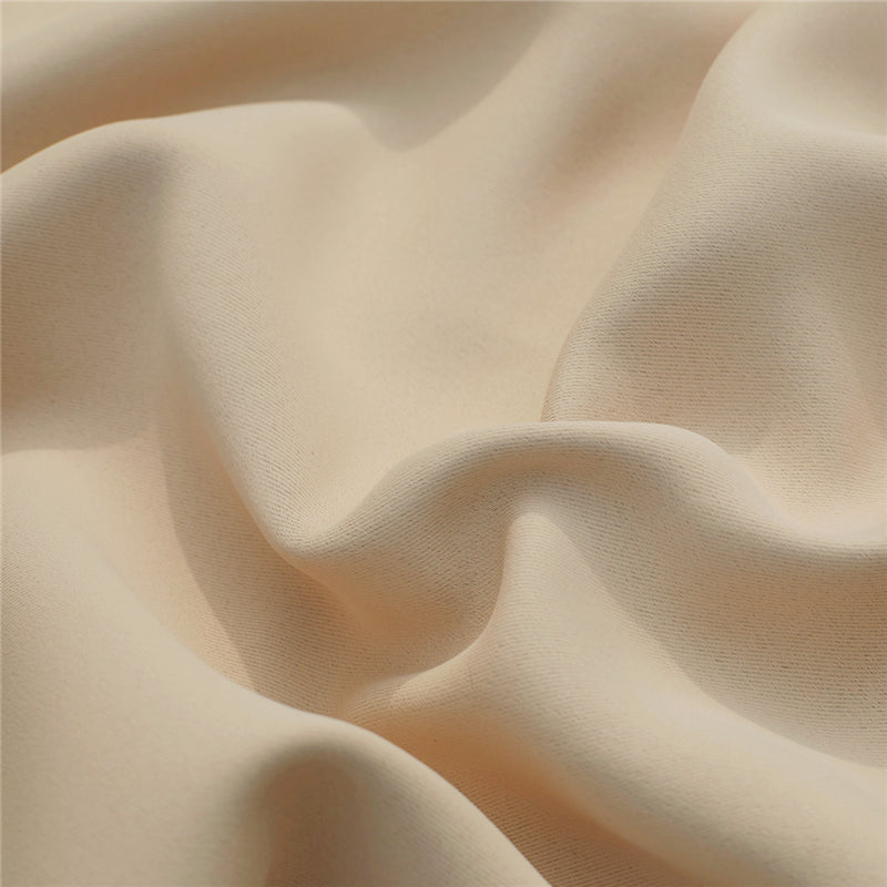 KGORGE outdoor curtain fabric sample close-up: textured beige material with soft folds, ideal for weatherproof patio shades.