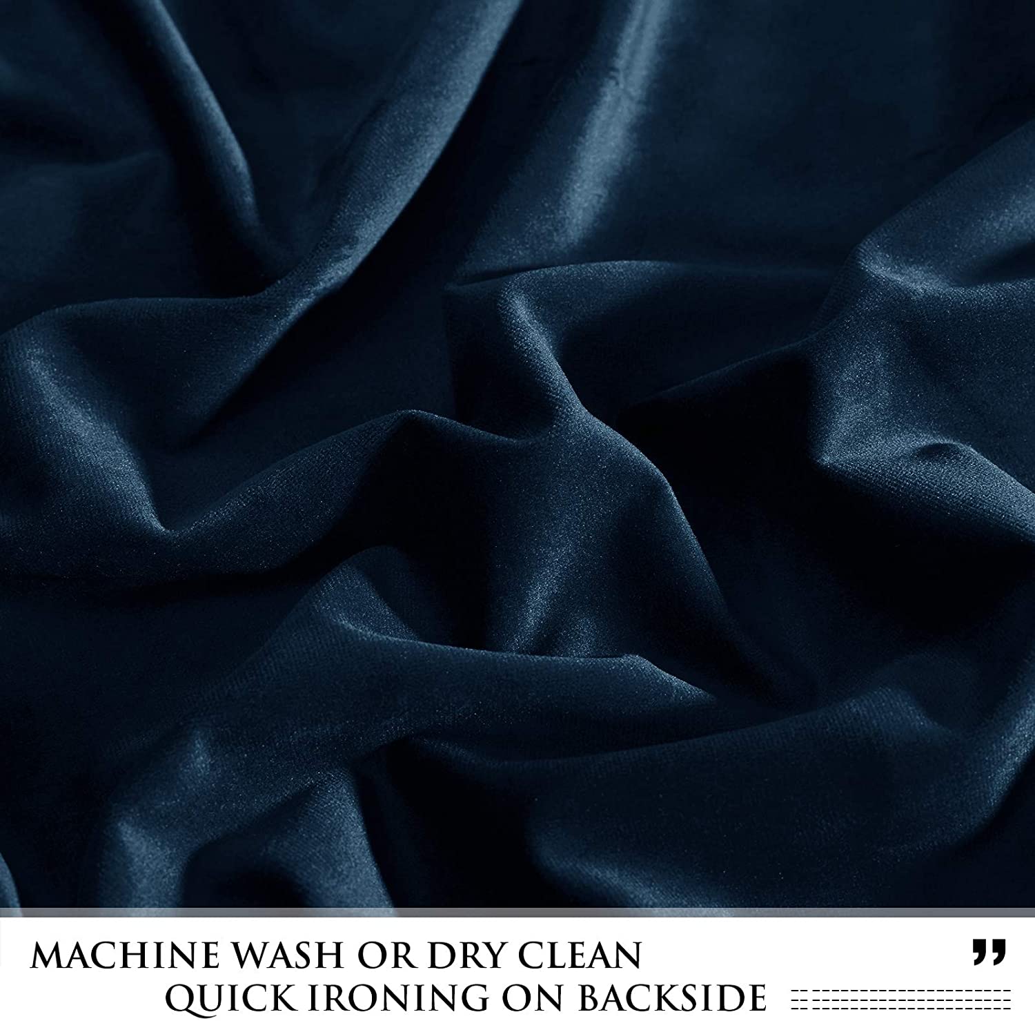 Close-up of a dark blue velvet curtain fabric sample, revealing its luxurious plush texture, soft folds, and subtle sheen.