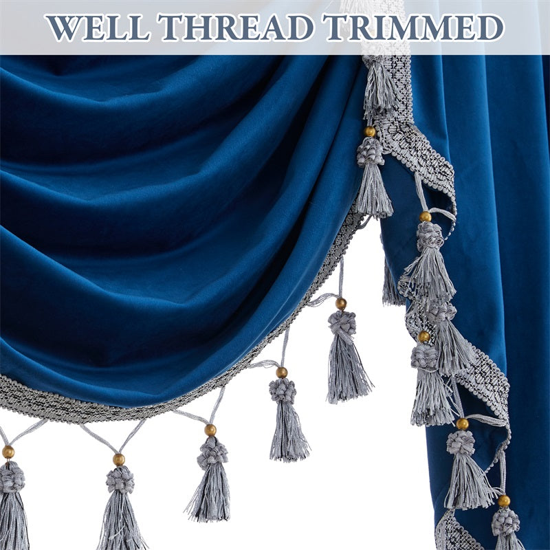Close-up of rich blue velvet waterfall valance featuring intricate silver-grey tassel trim and elegant detailing for living room.