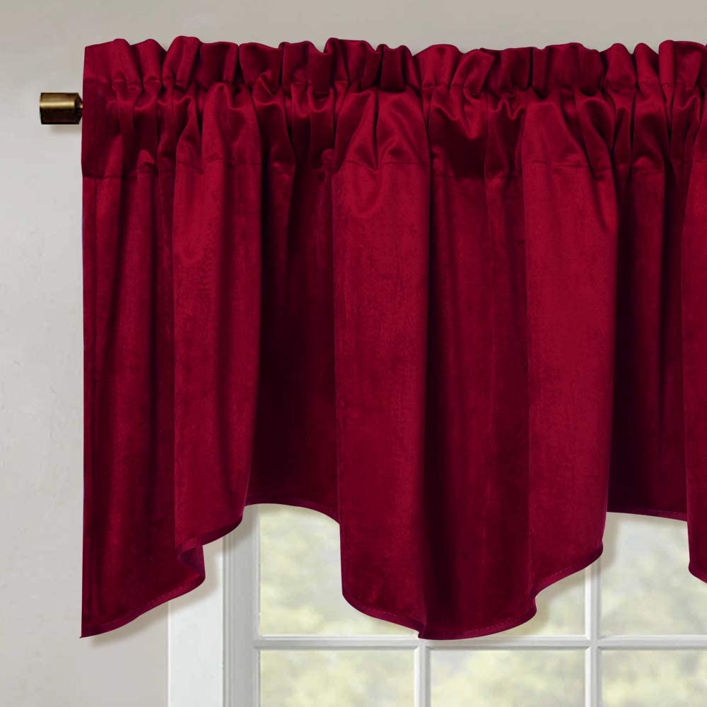 Deep red velvet blackout rod pocket valance for kitchen & living room, featuring a modern scalloped edge over a window.