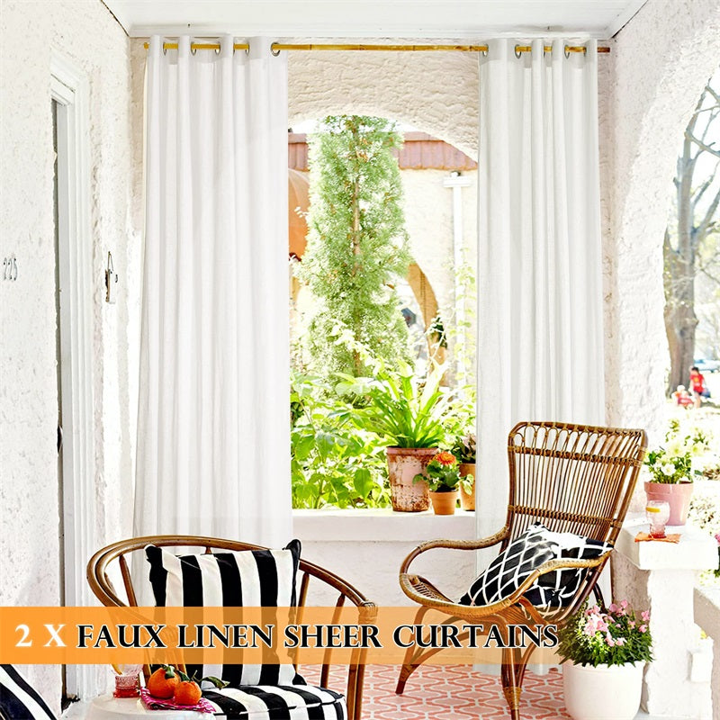 Two white faux linen sheer grommet curtains on a sunny patio, with rattan chairs and lush greenery.