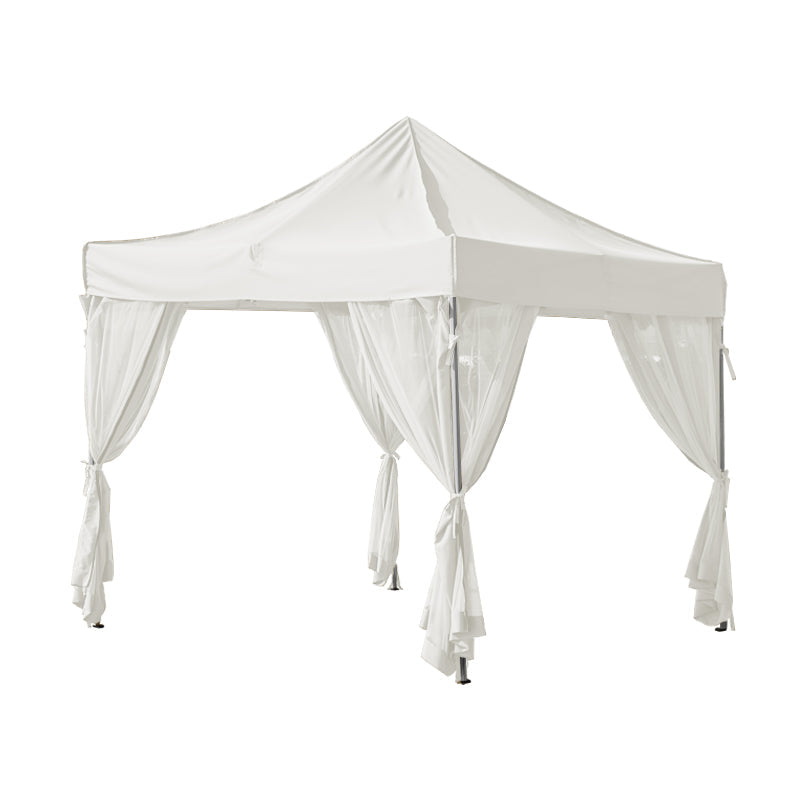 White outdoor gazebo with sheer mosquito netting sidewall curtain panels tied back, ideal for patio shade & insect protection.