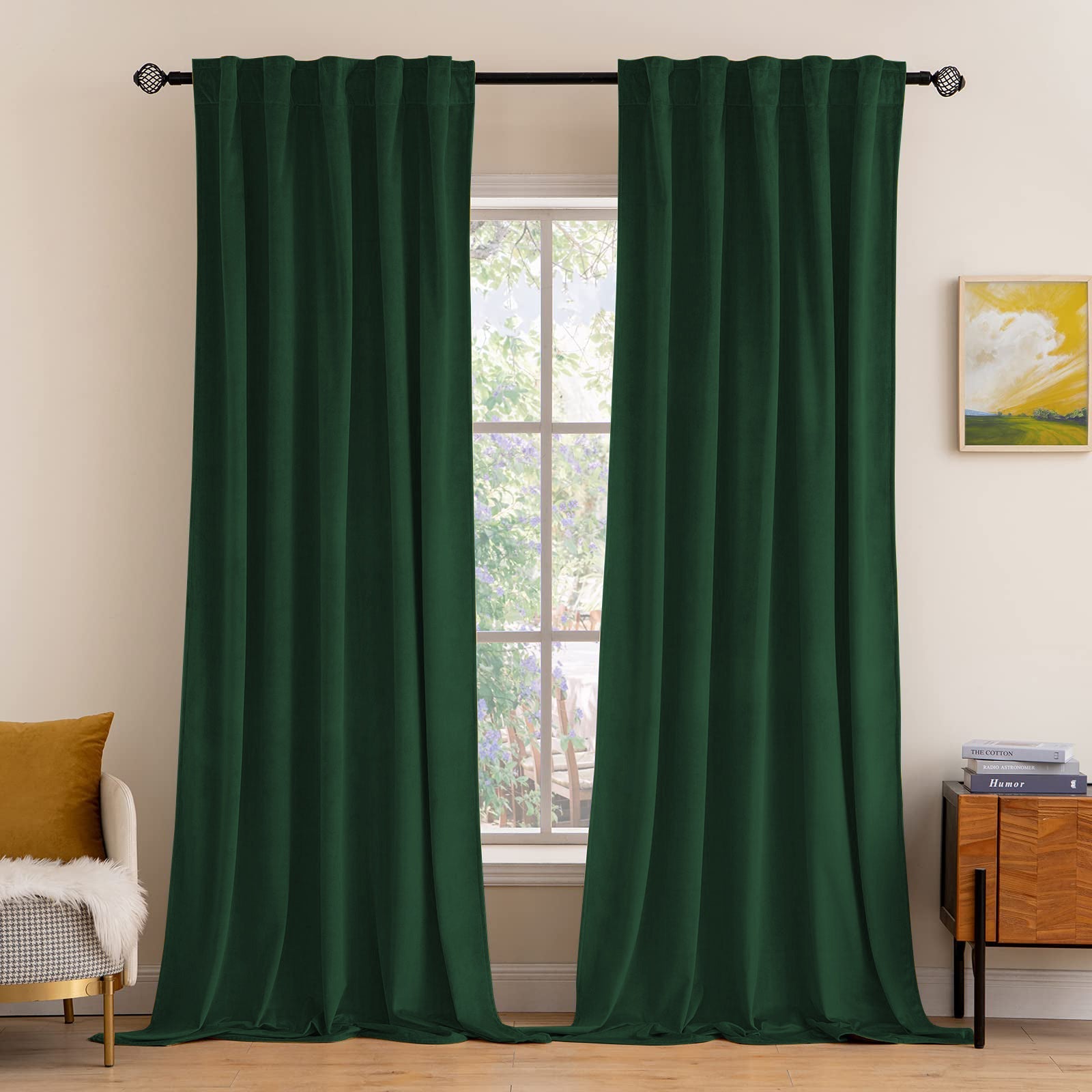 Elegant dark green velvet rod pocket & back tab blackout curtains for living room or bedroom, offering noise reduction and privacy.