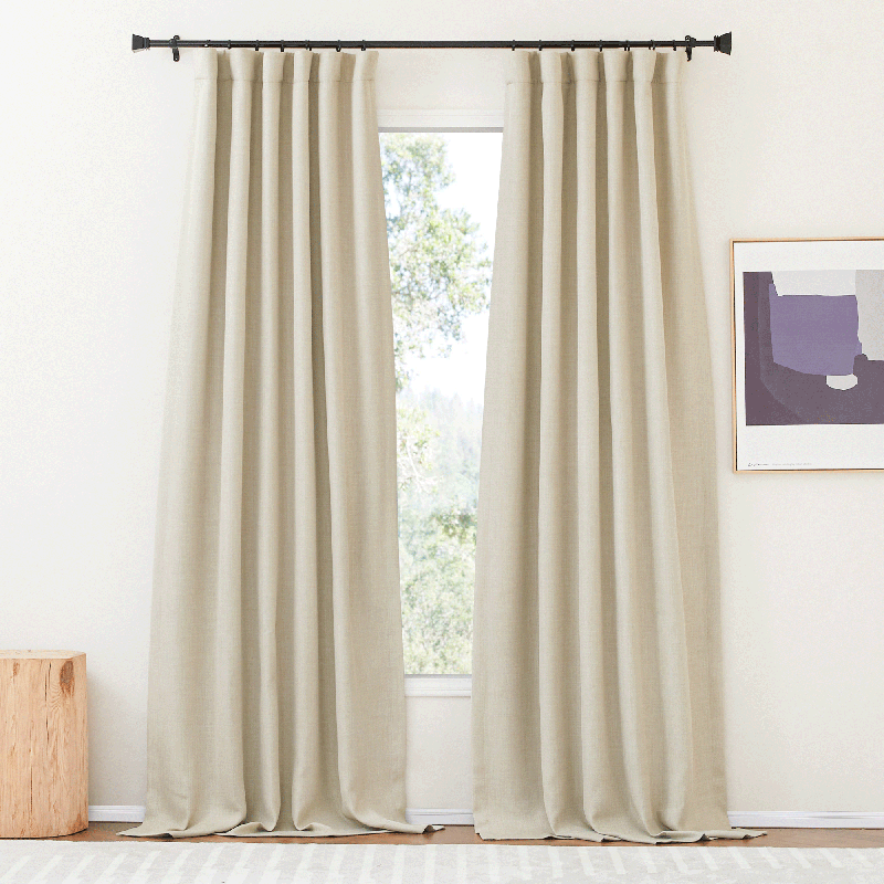 Pair of solid beige rod pocket & back tab blackout curtains for living room or bedroom, providing excellent privacy & room darkening.