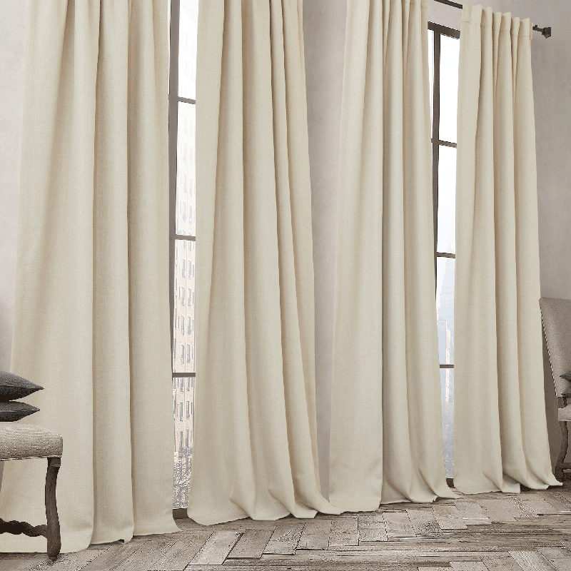 Full-length cream plain blackout curtains with rod pocket & back tab, 2 panels, perfect for living room or bedroom window coverage.