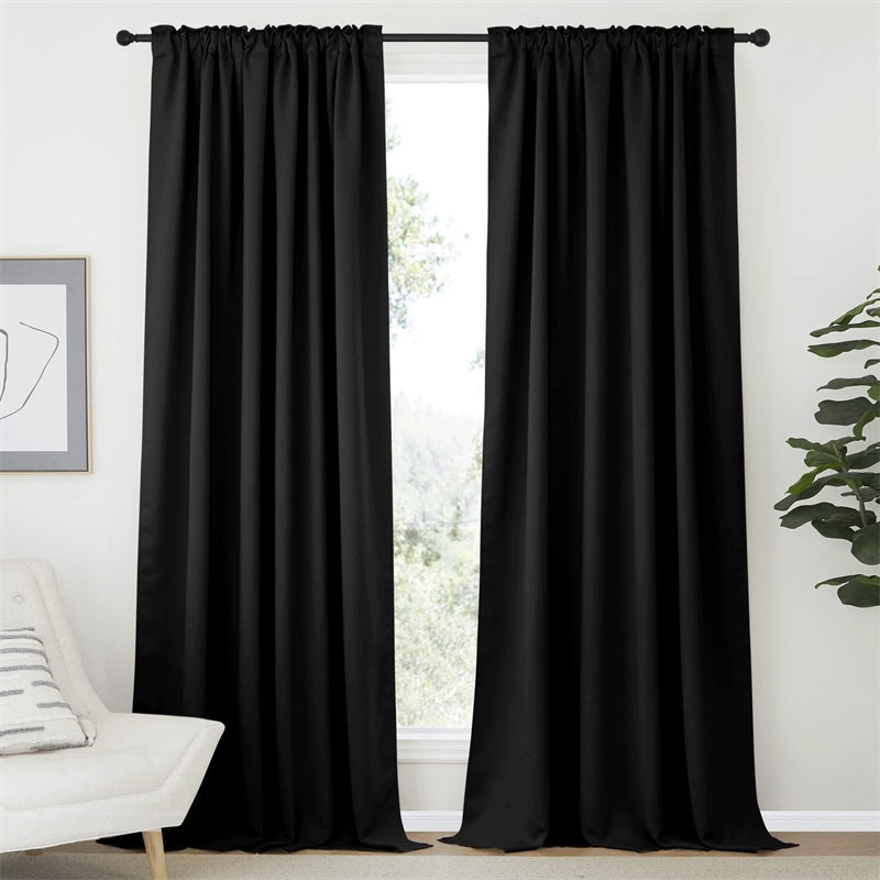 Pair of 52-inch black rod pocket blackout curtains for living room or bedroom, providing effective light blocking & privacy.