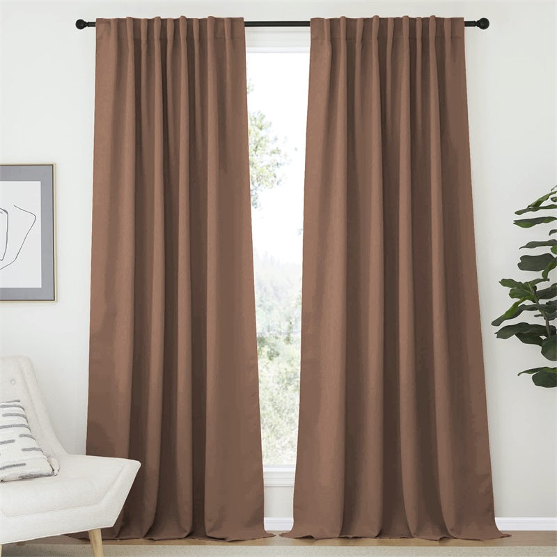 Two rich brown 52-inch wide rod pocket & back tab blackout curtain panels for living room or bedroom.