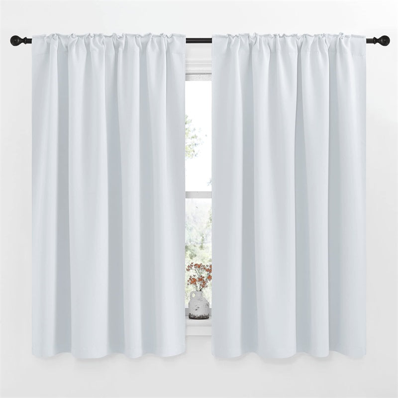 Two white rod pocket blackout curtains (52-inch, 2 panels) for living room or bedroom on a black rod over a window.