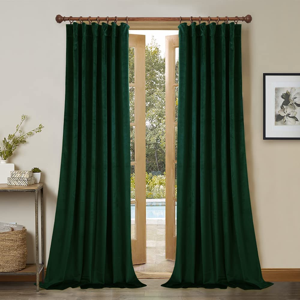 Solid dark green velvet room darkening curtains with rod pocket & back tab for living room or bedroom privacy.