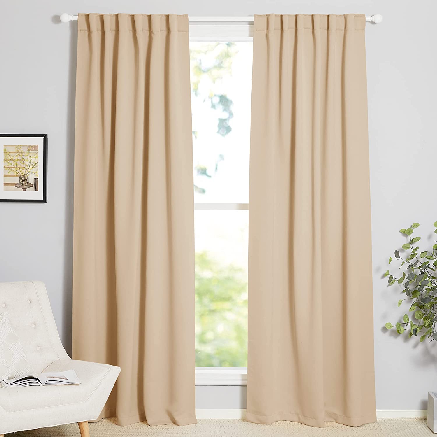 Pair of beige thermal insulated blackout curtains with Rod Pocket & Back Tab for living room or bedroom window.