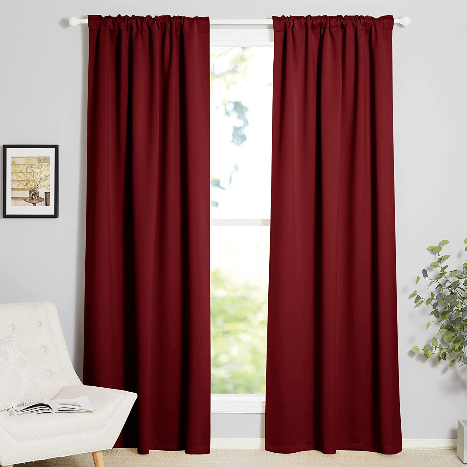Two deep burgundy 70-inch wide rod pocket thermal insulated blackout curtains for living room or bedroom privacy.