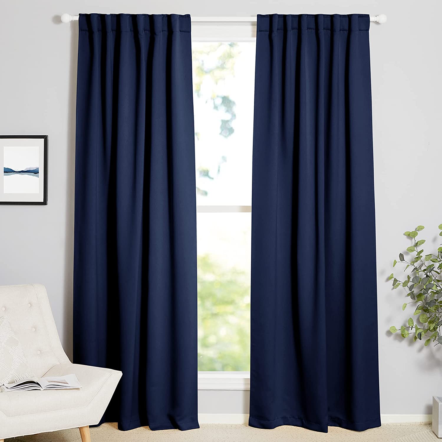 Navy blue rod pocket thermal blackout curtains (2 panels) for living room or bedroom, enhancing insulation.