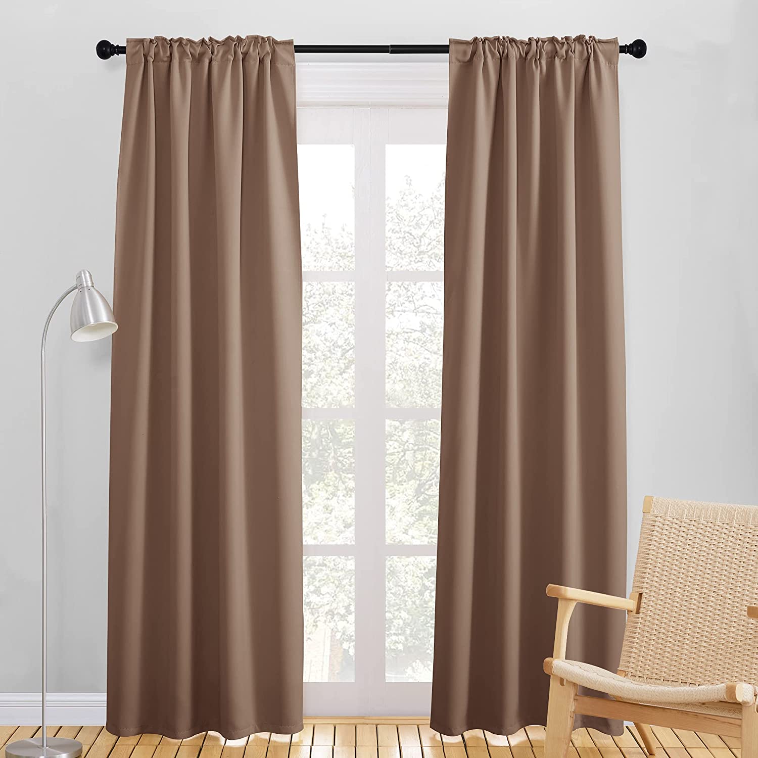Brown rod pocket & back tab thermal insulated blackout curtains (2 panels), fully drawn for a living room or bedroom.