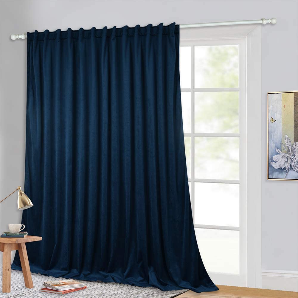 Rich navy velvet blackout curtain, 100 inch wide rod pocket panel, ideal for sliding glass doors or large living room windows.
