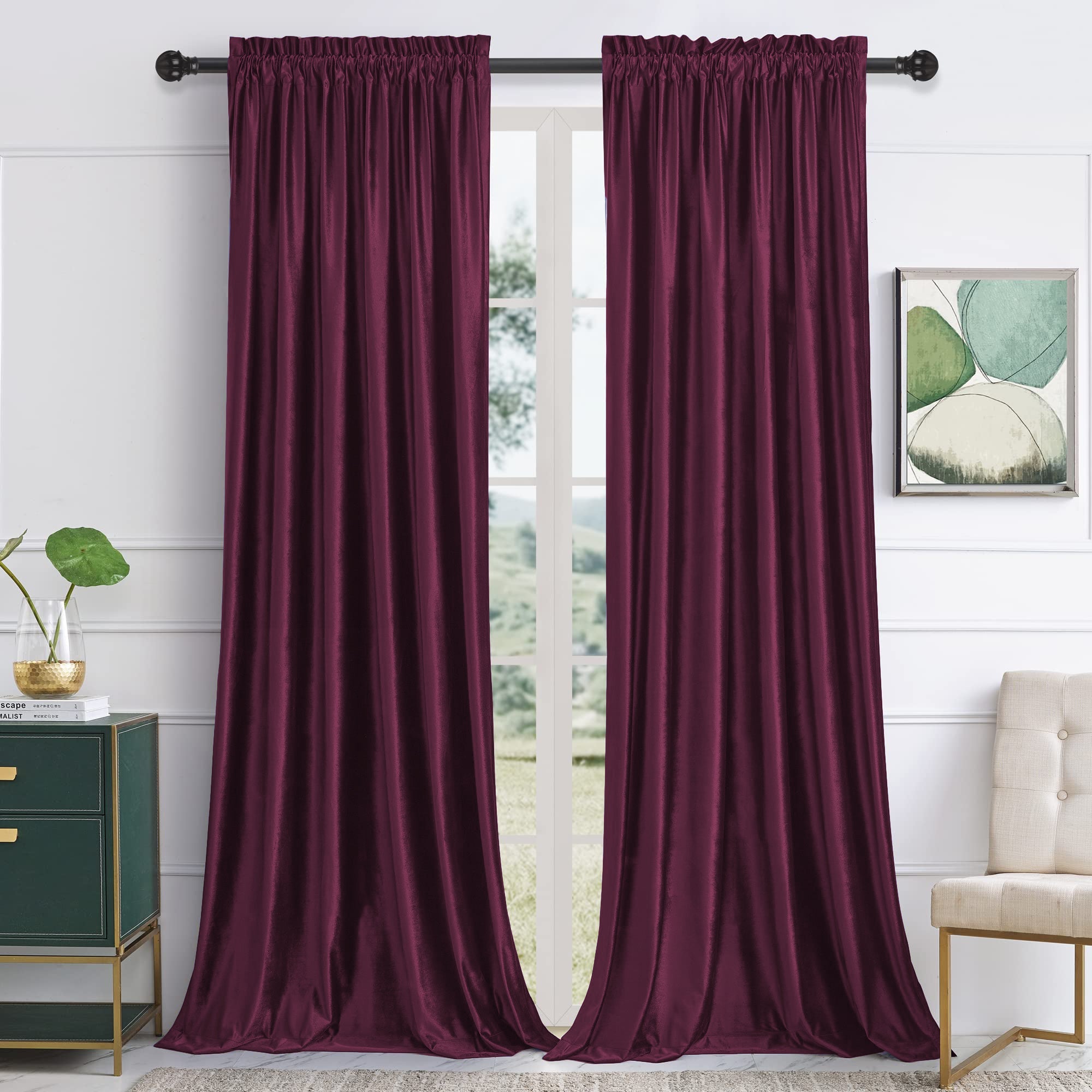 Plush burgundy velvet rod pocket blackout curtains (2 panels) for a living room, providing noise reduction and privacy.