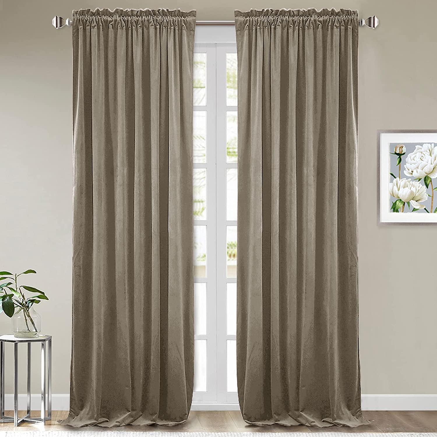 Two taupe velvet rod pocket blackout curtains covering a window, designed for living room & bedroom noise reduction.