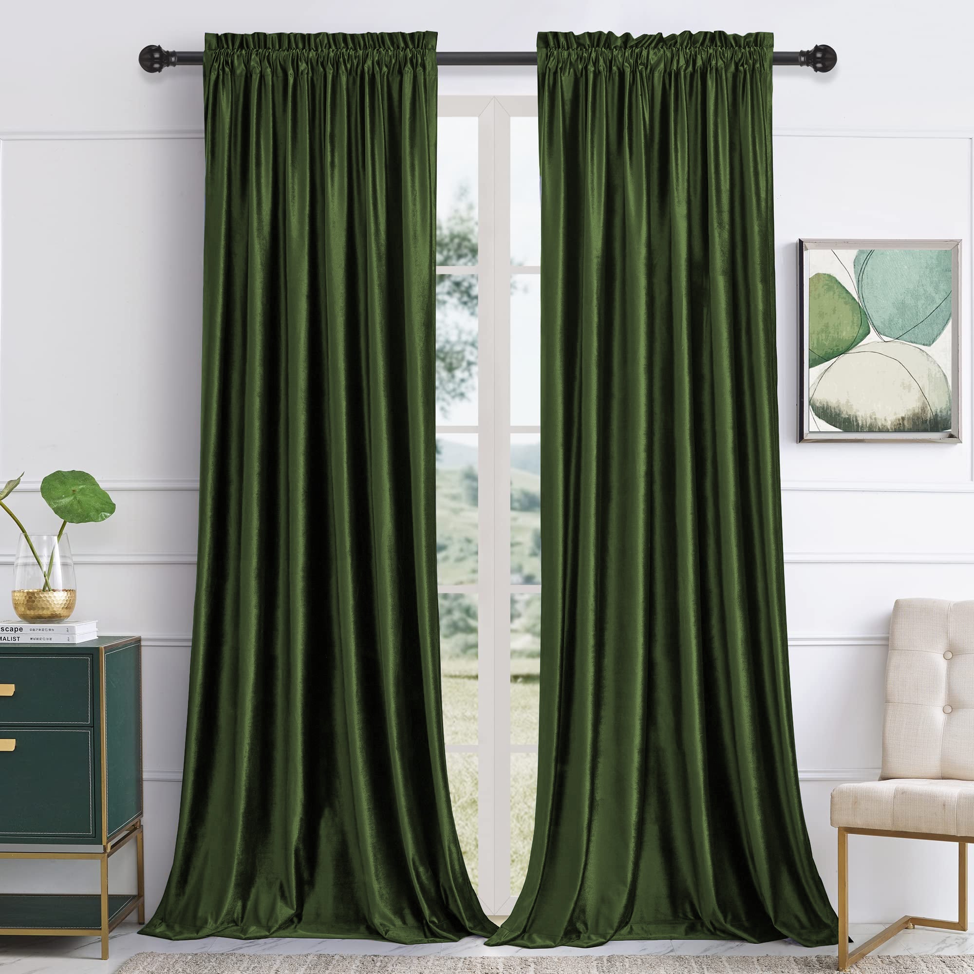 Pair of dark green velvet rod pocket blackout curtains for living room & bedroom, offering noise reduction & privacy.