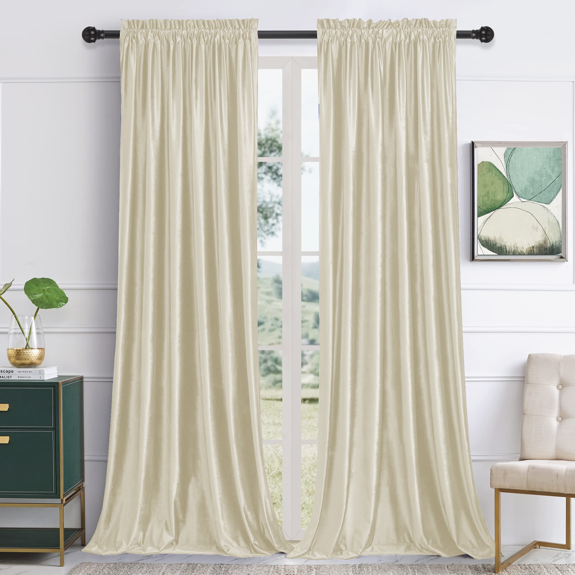 Elegant 2-panel cream velvet rod pocket blackout curtains in a living room, providing noise reduction and complete privacy.