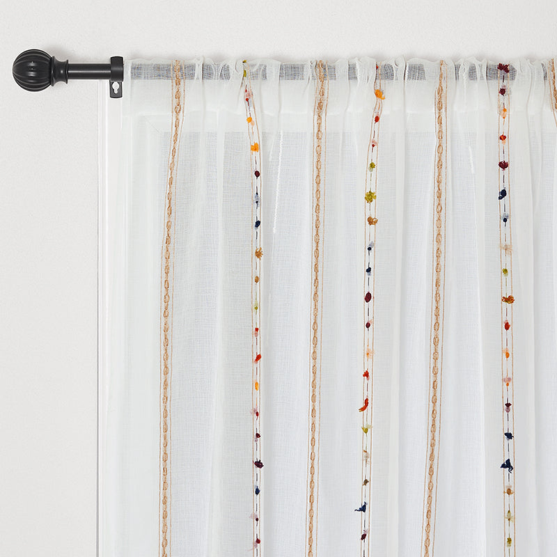 White rod pocket sheer privacy curtain featuring vertical brown stitched stripes and colorful yarn embroidery details