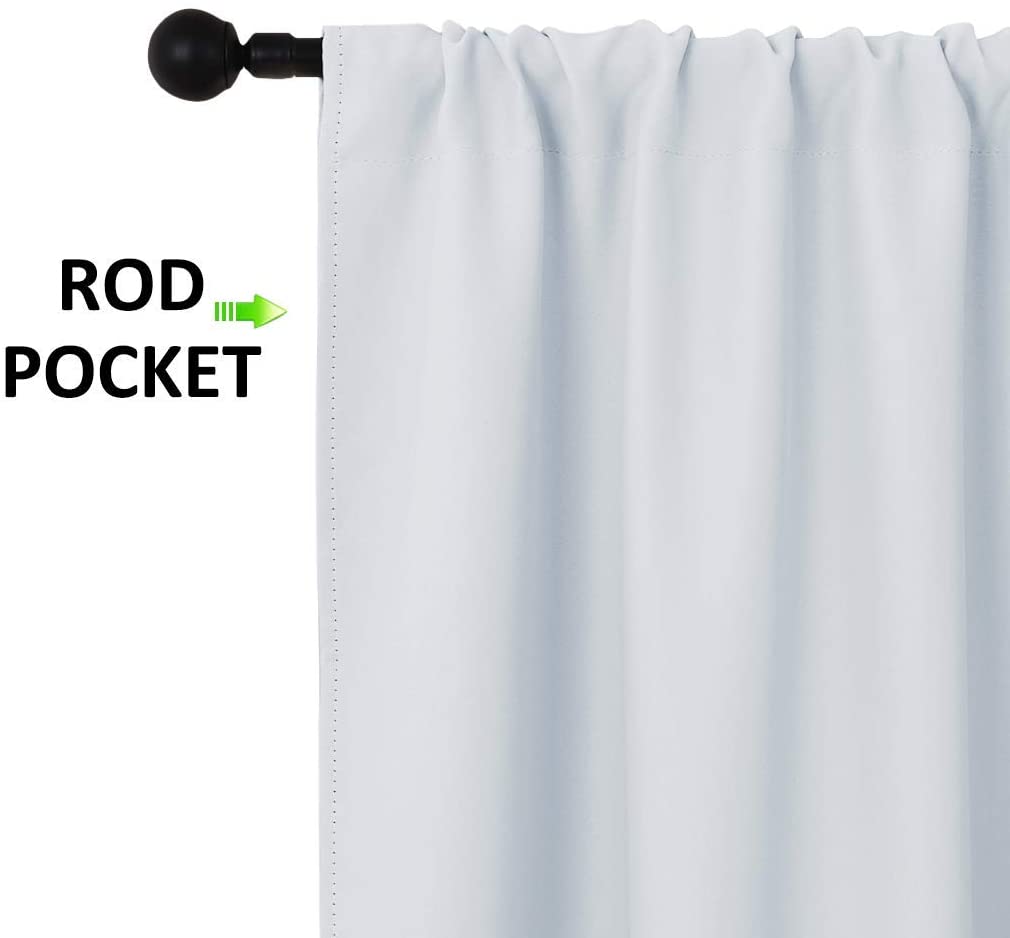 Detailed view of light gray rod pocket thermal insulated blackout curtain header, showing fabric gathered on a black rod. Living room, bedroom.