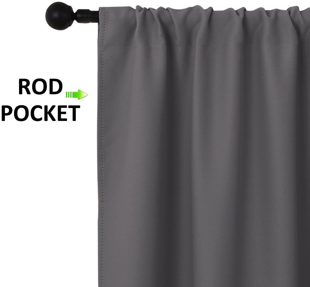Grey triple weave blackout curtain detail, showcasing the rod pocket design on a black rod for living room & bedroom.