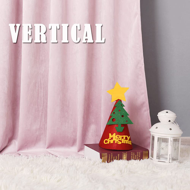 Textured pink velvet rod pocket curtain panel with festive Christmas hat, a book, and white lantern on a plush white rug.