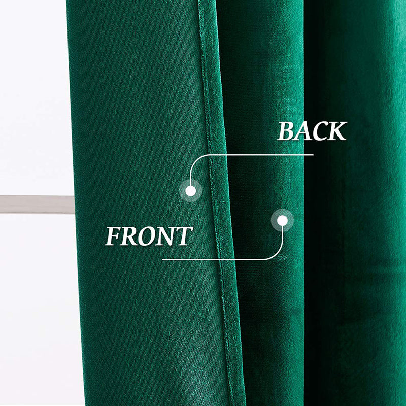 Detailed shot of a green velvet blackout curtain, highlighting the luxurious front and the thick noise-reducing back.